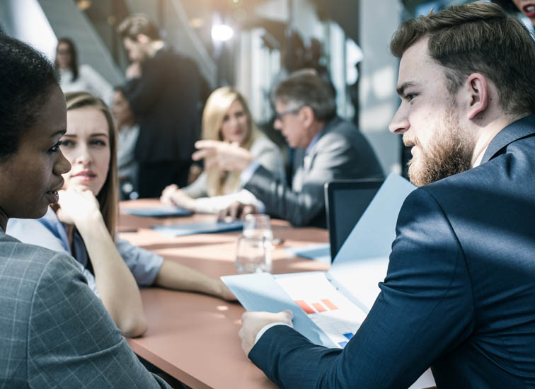 Business People Having a Meeting in the Board Room