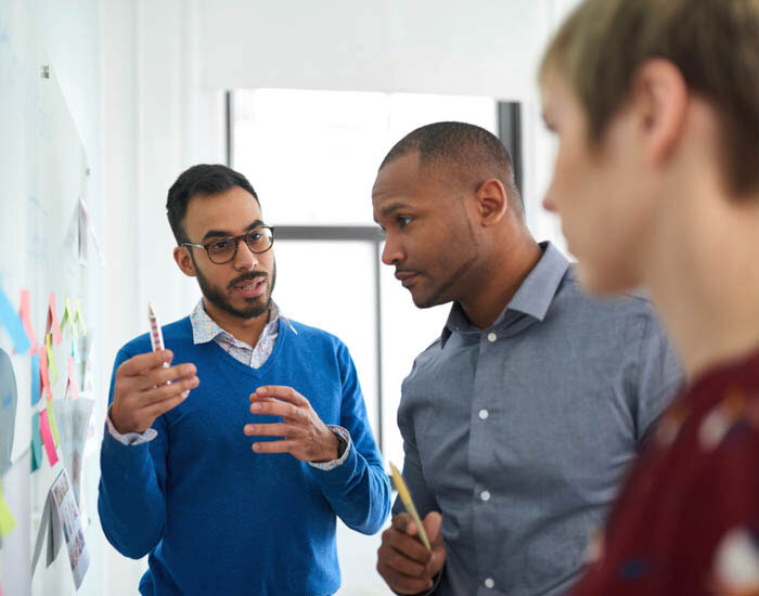 Team of coworkers in a brainstorming session.